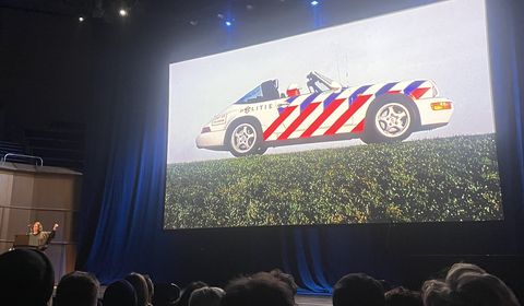 Studio Dumbar's presentation slide of an iconic striped Dutch police car